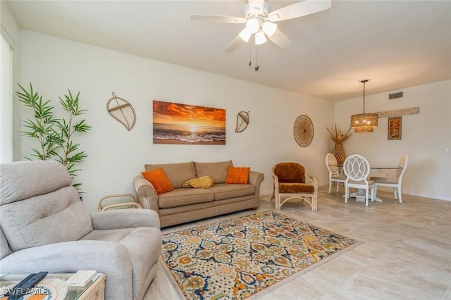 living room featuring ceiling fan