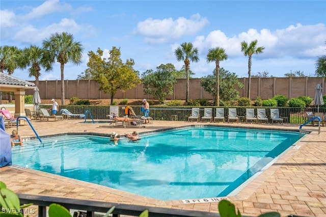 view of pool featuring a patio