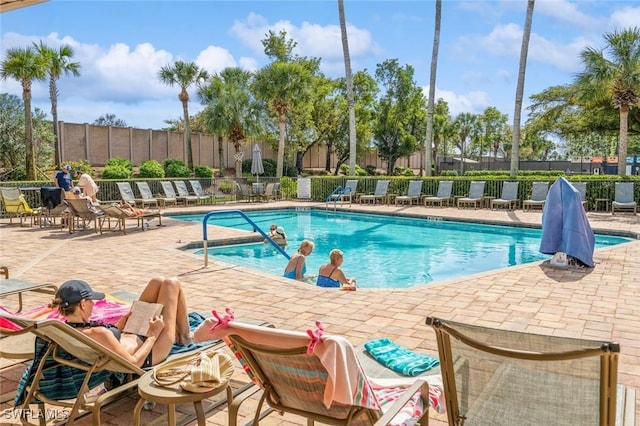 view of pool featuring a patio