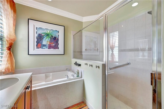 bathroom featuring ornamental molding, vanity, and plus walk in shower