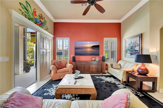 tiled living room with ornamental molding and ceiling fan