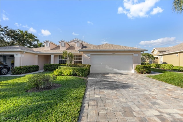 single story home with a garage and a front yard