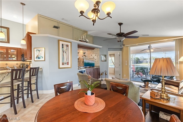 dining space with a chandelier