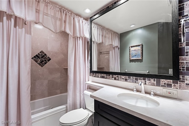 full bathroom with shower / bath combo, vanity, backsplash, and toilet