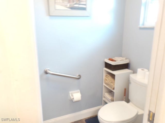 bathroom featuring toilet