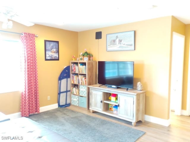 living room with wood-type flooring