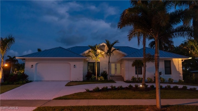 view of front of house with a garage