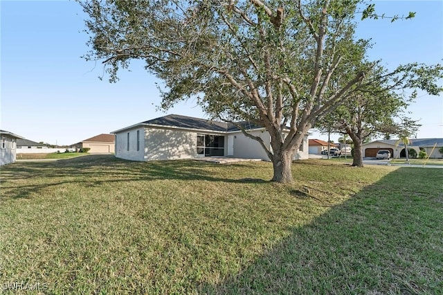 view of front of home featuring a front yard