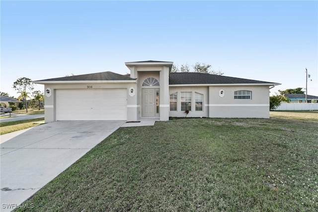 3016 SW 6th Ave, Cape Coral, FL 33914 - single story home with a garage, driveway, a front yard, and stucco siding