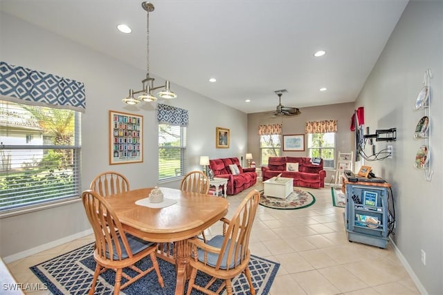 dining room with ceiling fan and light tile patterned floors