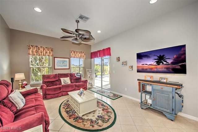 tiled living room featuring ceiling fan