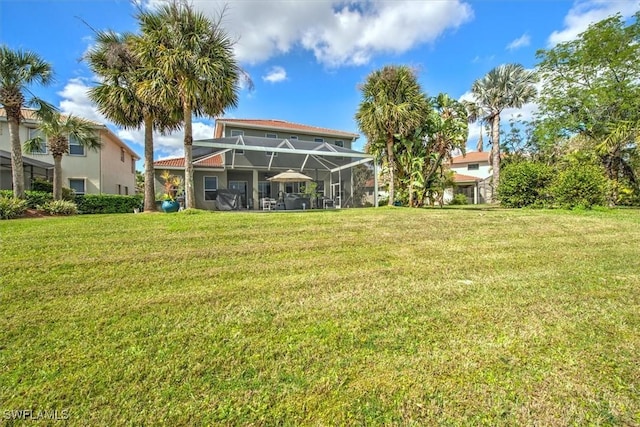 view of yard with a lanai