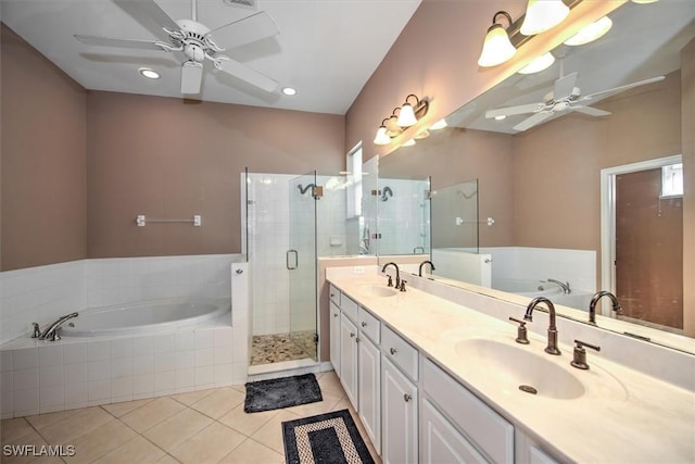 bathroom featuring ceiling fan, vanity, plus walk in shower, and tile patterned flooring