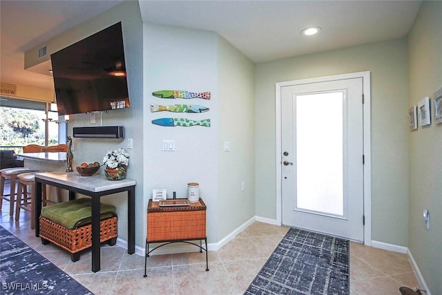 interior space with light tile patterned flooring