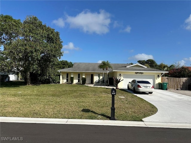 single story home featuring a garage and a front yard