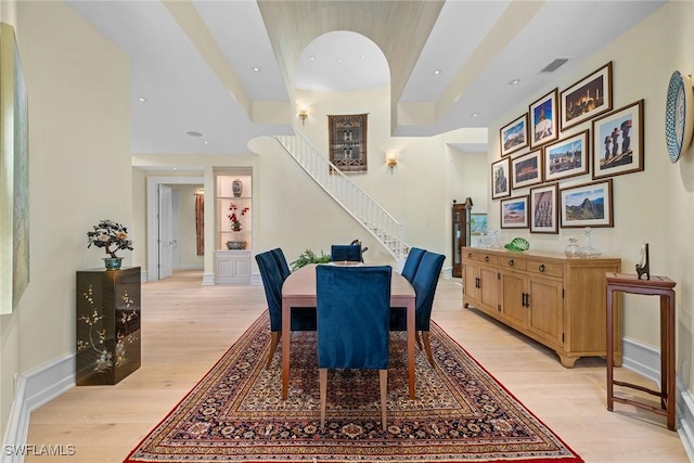 dining space with light wood-type flooring