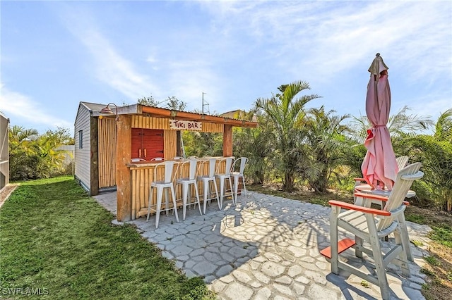 view of patio / terrace with exterior bar