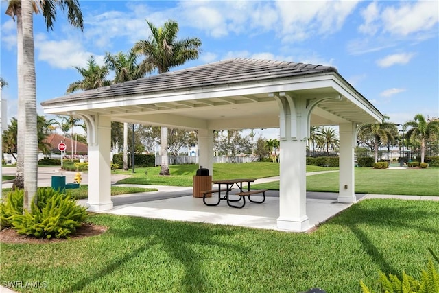 view of community with a lawn and a gazebo