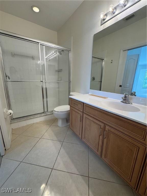 19930 Barletta Ln Unit 1324, Estero, FL 33928 - full bath featuring visible vents, toilet, a stall shower, tile patterned floors, and vanity