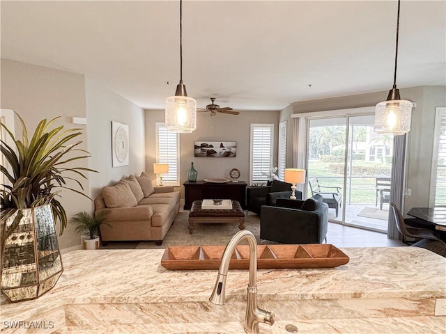 living room featuring ceiling fan