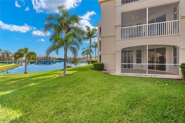 view of yard with a water view