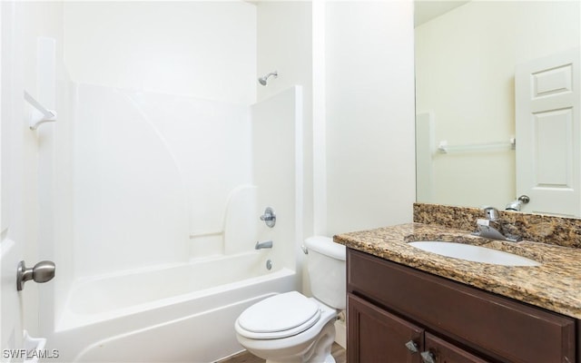 full bathroom featuring vanity, tub / shower combination, and toilet