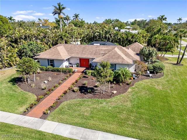 view of front of property with a front lawn