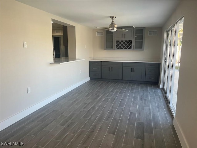 unfurnished dining area with ceiling fan