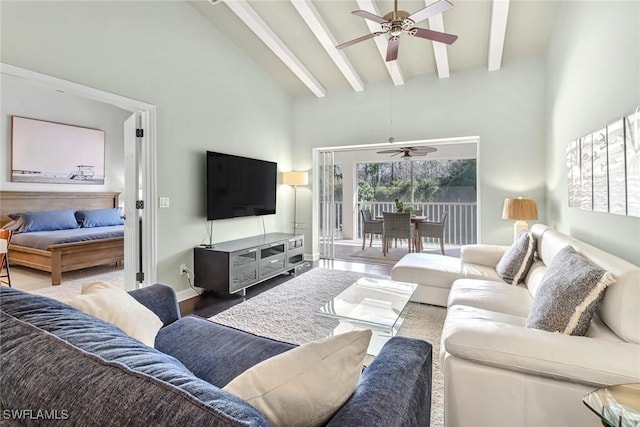 living room with wood finished floors, baseboards, high vaulted ceiling, beam ceiling, and ceiling fan