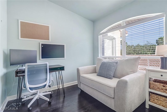 office area featuring baseboards and wood finished floors