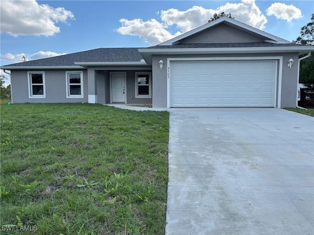 ranch-style house featuring a garage and a front yard