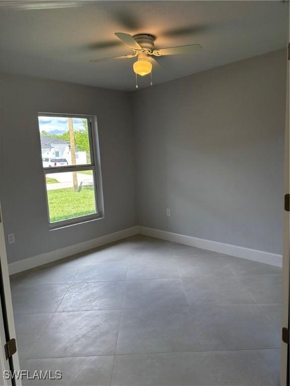 unfurnished room featuring ceiling fan