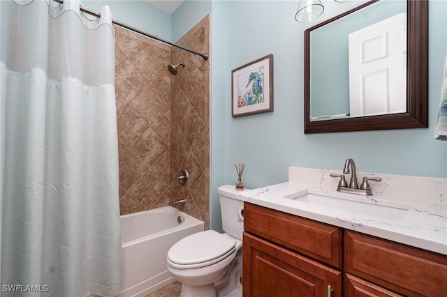 full bathroom featuring vanity, shower / tub combo, and toilet