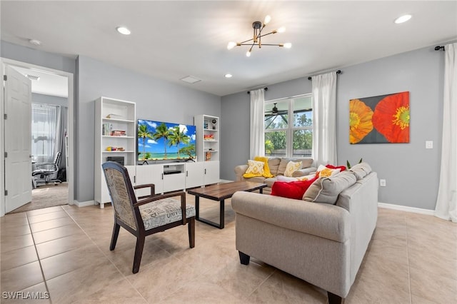 living area featuring a chandelier, recessed lighting, baseboards, and light tile patterned floors