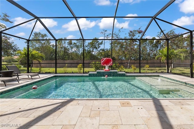 view of swimming pool featuring a lanai, fence, a fenced in pool, and a patio