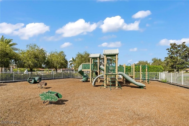 community jungle gym featuring fence