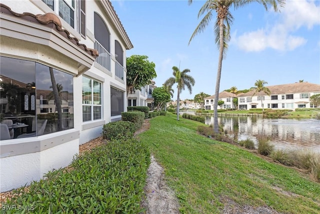 view of yard with a water view