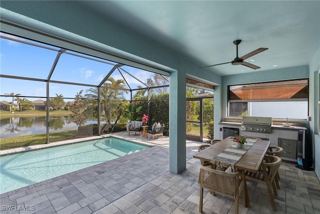 view of swimming pool with a patio area, area for grilling, a water view, grilling area, and a lanai