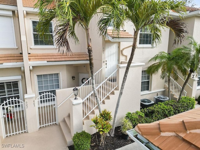 entrance to property with central air condition unit