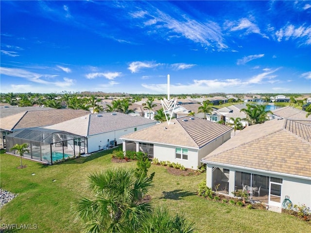 drone / aerial view with a residential view