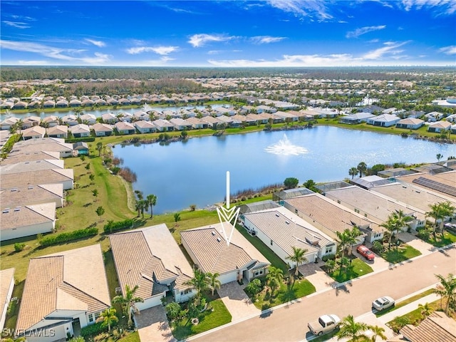 bird's eye view with a water view and a residential view