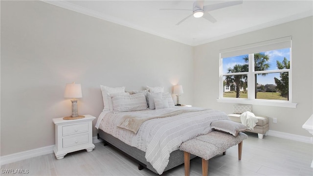 bedroom featuring crown molding, baseboards, and ceiling fan