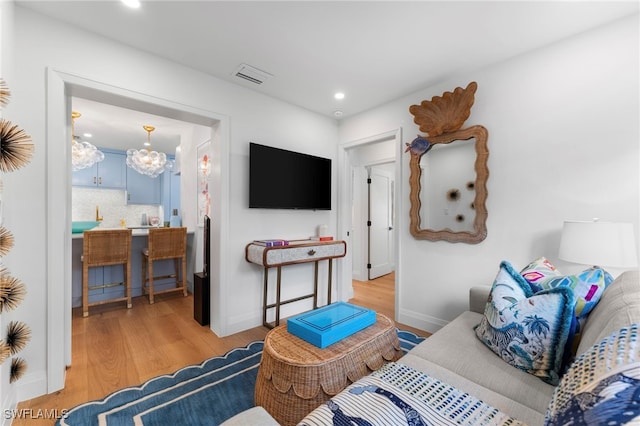 living room featuring light hardwood / wood-style flooring