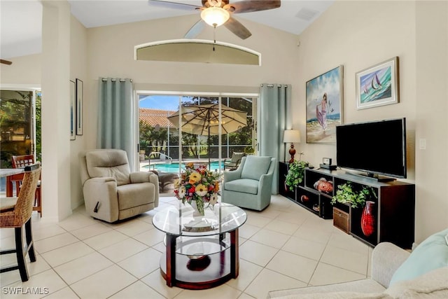 living room with light tile patterned floors and ceiling fan