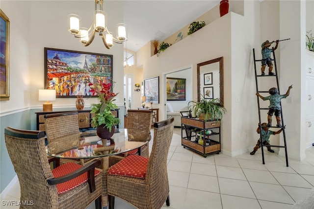 dining room with light tile patterned flooring and a notable chandelier