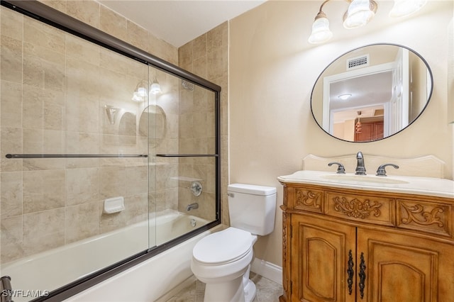 3458 Hancock Bridge Pkwy Unit 114, North Fort Myers, FL 33903 - full bath featuring toilet, vanity, enclosed tub / shower combo, and baseboards