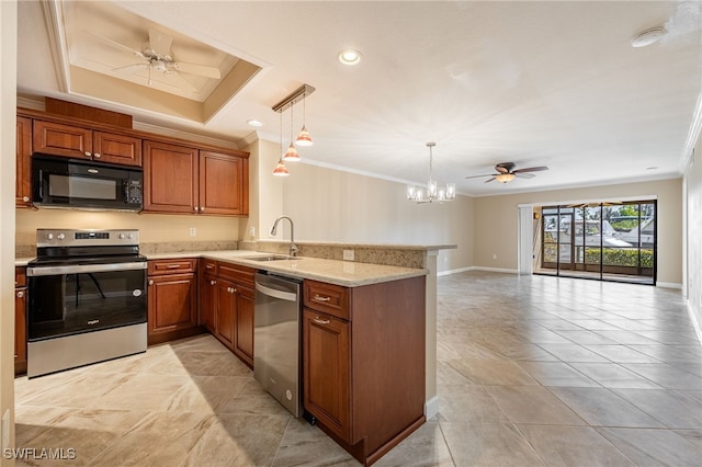 3458 Hancock Bridge Pkwy Unit 114, North Fort Myers, FL 33903 - kitchen featuring stainless steel appliances, crown molding, a sink, a peninsula, and brown cabinetry