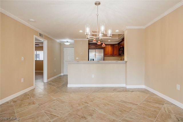 3458 Hancock Bridge Pkwy Unit 114, North Fort Myers, FL 33903 - kitchen with stainless steel fridge, black microwave, crown molding, light countertops, and a chandelier