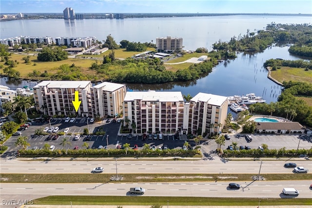 3458 Hancock Bridge Pkwy Unit 114, North Fort Myers, FL 33903 - drone / aerial view of apartment complex and a nearby body of water