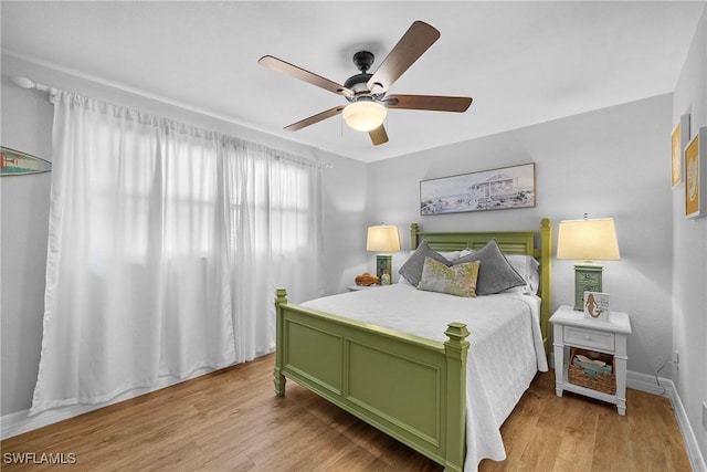 bedroom featuring ceiling fan and light wood-type flooring